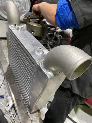 cast aluminum elbow welded to intercooler